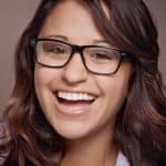 smiling woman in glasses